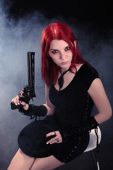 Sexy woman with a gun