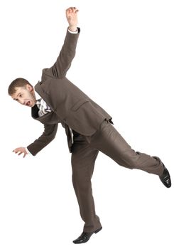Businessman almost falling and standing on onr leg isolated on white background