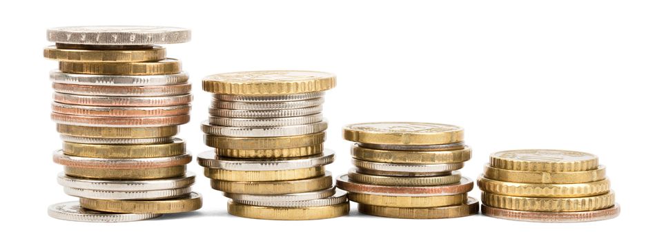 Four piles of gold coins isolated on white background, front view