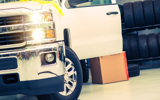 Tire Replacing Service. Pickup Truck in the Tire Service.