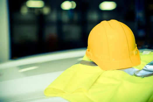 Yellow Construction Helmet Closeup Photo. Construction Safety Equipment.