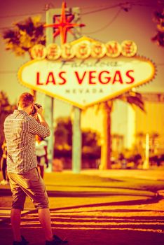 Photographer Taking Pictures in Las Vegas. Las Vegas, Nevada, United States. Warm Color Grading.