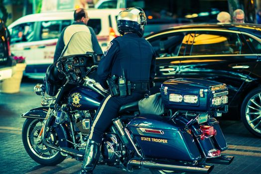 State Trooper on Motorcycle. Policeman on Bike. 