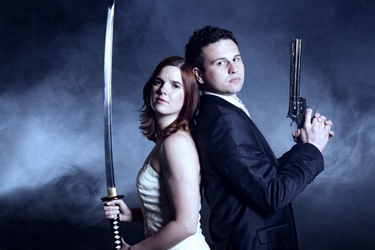 Couple with weapons
