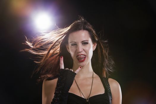 Young Woman Showing Yo Sign; Indoors