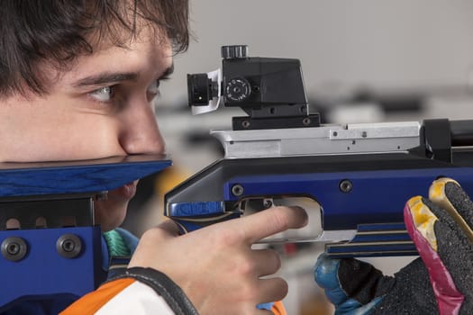 Close-up Of A Male Athlete Doing Target Practice