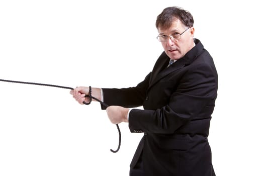 Business man pulling a rope