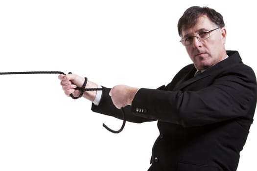 Business man pulling a rope