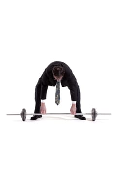 Mature Businessman Lifting Barbell Over White Background