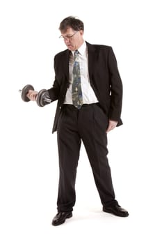 Mature Businessman Lifting Barbell Over White Background