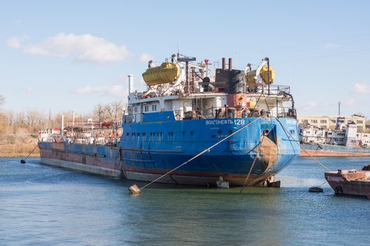 Volgograd, Russia - November 4, 2015: Volgoneft feed vessel 128, which is being repaired in dock of "Krasnoarmeysky Shipyard", Volgograd