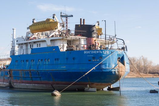 Volgograd, Russia - November 4, 2015: Volgoneft feed vessel 128, which is being repaired in dock of "Krasnoarmeysky Shipyard", Volgograd