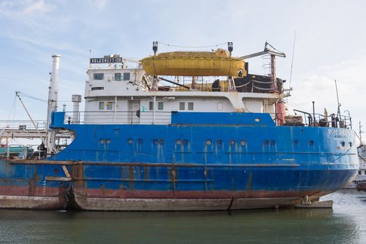 Volgograd, Russia - November 4, 2015: Volgoneft feed vessel 128, which is being repaired in dock of "Krasnoarmeysky Shipyard", Volgograd
