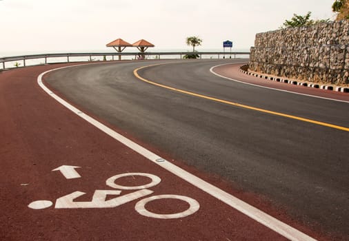 Bicycle road sign and arrow in outdoors