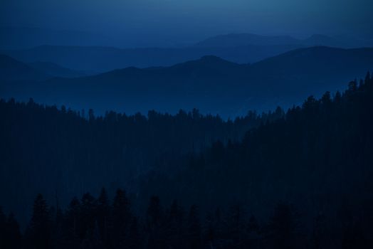 Mountain Hills Silhouettes. Summer Evening in the Sierra Nevada Mountains.