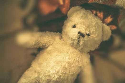 Vintage Teddy Bear on the Bed. Vintage Toy