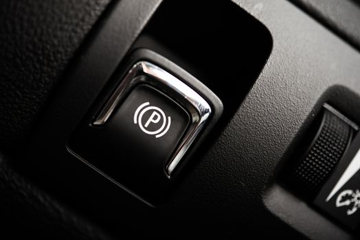 Electronic Brake Button. Modern Car Feature. Brake Button Closeup
