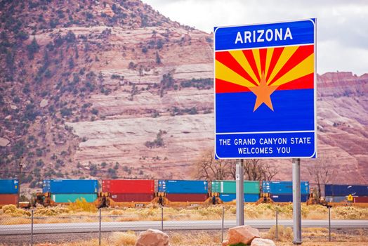 Arizona State Entrance Sign, Highway and the Railroad. Arizona, United States.Welcome in Arizona.
