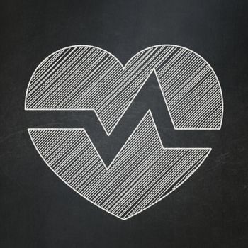 Health concept: Heart icon on Black chalkboard background