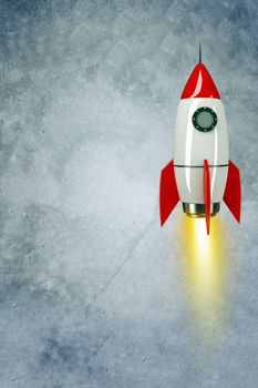 Space rocket with fire on grey wall background