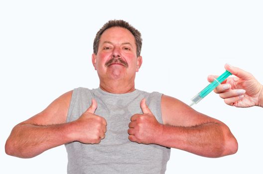 Thumbs up! Man showing two thumbs up. On the right edge of a hand with syringe.