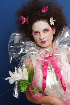 Woman with geisha like make-up and cellophane