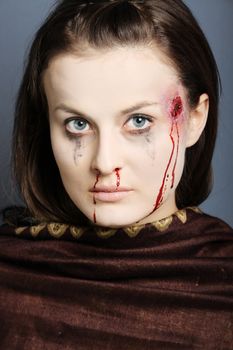 Portrait of a woman shot in the head.