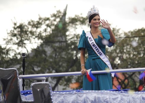 PHILIPPINES, Manila: Miss Universe 2015 Pia Alonzo Wurtzbach of the Philippines receives warm welcome from Filipino fans during her grand victory parade in Manila, Philippines on January 25, 2016. The parade began at past 2 p.m. at the Sofitel Philippine Plaza Manila, and ended at Ayala Avenue in Makati City. Wurtzbach was crowned Miss Universe in December in a drama-filled show after the pageant's host, comedian Steve Harvey, misread his cue card and initially announced Miss Colombia as the winner before apologizing and saying Wurtzbach had won.