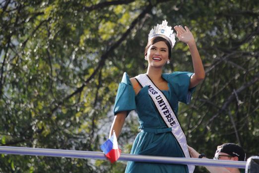 PHILIPPINES, Manila: Miss Universe 2015 Pia Alonzo Wurtzbach of the Philippines receives warm welcome from Filipino fans during her grand victory parade in Manila, Philippines on January 25, 2016. The parade began at past 2 p.m. at the Sofitel Philippine Plaza Manila, and ended at Ayala Avenue in Makati City. Wurtzbach was crowned Miss Universe in December in a drama-filled show after the pageant's host, comedian Steve Harvey, misread his cue card and initially announced Miss Colombia as the winner before apologizing and saying Wurtzbach had won.