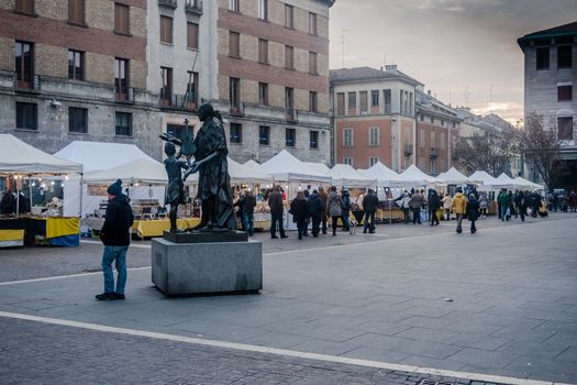 This is a street market in Cremona, Lombardy, Italy during the winter, some sundays, this was 24th january 2016.