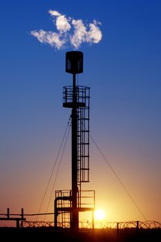 Torches for casing-head gas flaring during oil at sunset