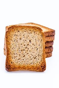 A slice of toast and a pile of slice of toast