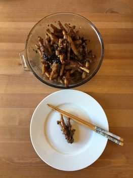 Chinese spicy chicken feet ready to eat.