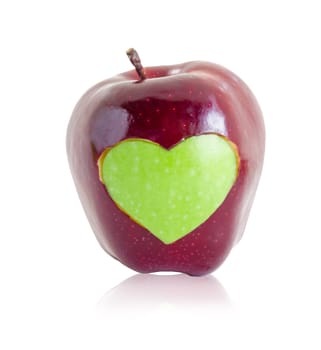 green apple heart shape in red apple isolated on white background. Save clipping path.