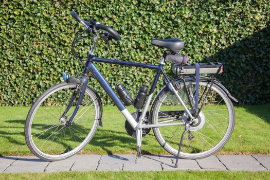 Electric bicycle in the sun, modern bike mostly used by seniors