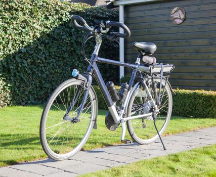 Electric bicycle in the sun, modern bike mostly used by seniors