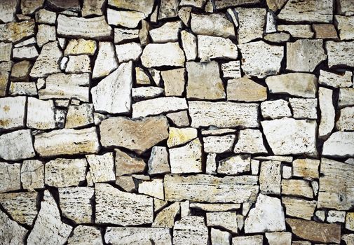 abstract background or a wall of broken stone
