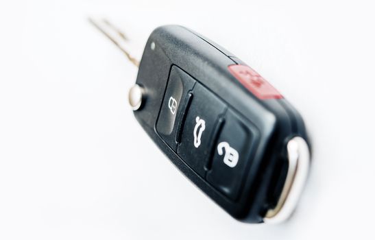 Car Ignition Key with Built-In Remote Locking. Car Keys Isolated on White.