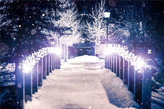 Park Bridge Holiday Illumination in Winter Season. Estes Park, Colorado.