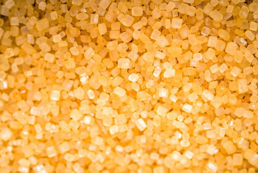 Raw Brown Sugar Closeup. Raw Sugar Crystals Macro Photo.