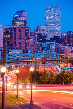 Denver Colorado Rush. Busy Denver Streets, Speer Boulevard Platte River Bridge and the City Skyline. October Night in Denver.