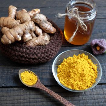 Turmeric powder with bee honey, agriculture product, nutrition, healthy food, natural cosmetic for beauty care, can treat stomach ache, also is spice for food,  aromatic flavor, organic yellow color