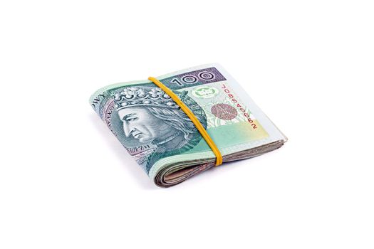 Bundle of Polish currency on a white background