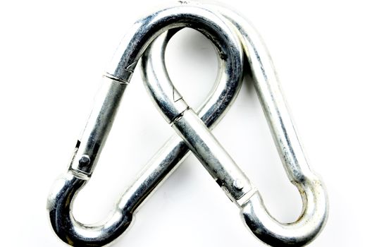 Two silver carabiner on white background
