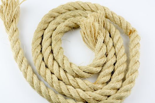 Rope rolled up on a white background. seamless