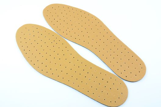 Brown leather shoe insoles provide additional comfort.
