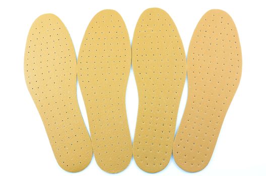 Brown leather shoe insoles provide additional comfort.
