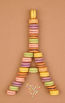 Macarons Eiffel Tower french sweet colorful,multicolored hearts.Fresh pastel delicious dessert on chocolate retro vintage background.Love,Valentines Day,romantic                                       