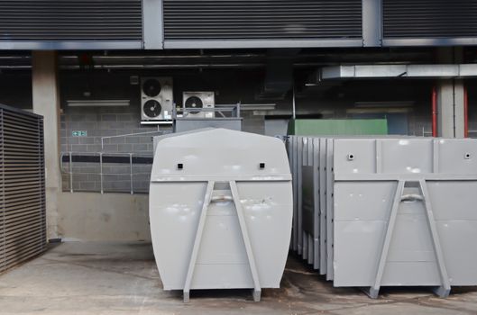 Large dumpster container, waste bin
on service yard

