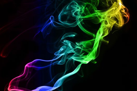 Smoke swirling on black background
